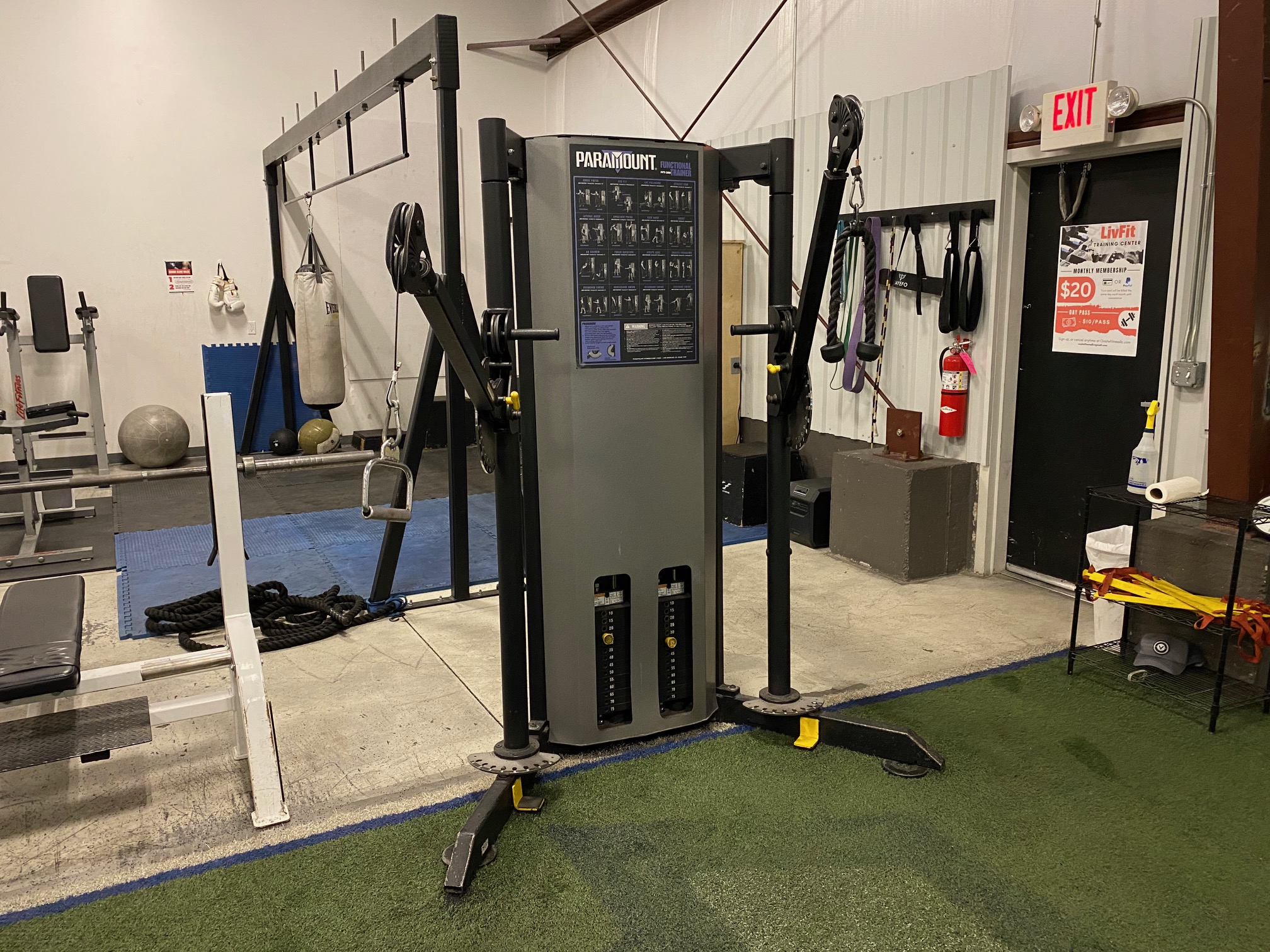 Cable fly exercise machine with adjustable cables.