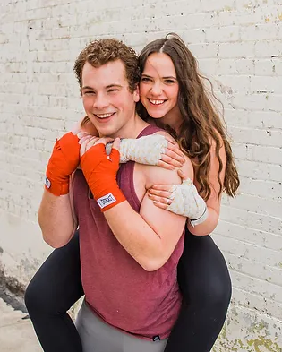 Mac Olsen smiling inside LivFit Training Center